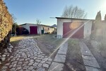 HORN IMMOBILIEN++ 15 km bis Neubrandenburg, schöne Doppelhaushälfte mit großen Grundstück & 2 Garagen - Doppelhaushälfte Bassow Bassow | Angebot:26855373